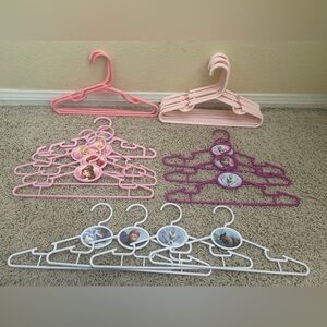 12 Disney Princess & Frozen & 14 plain pink plastic baby /toddler hangers